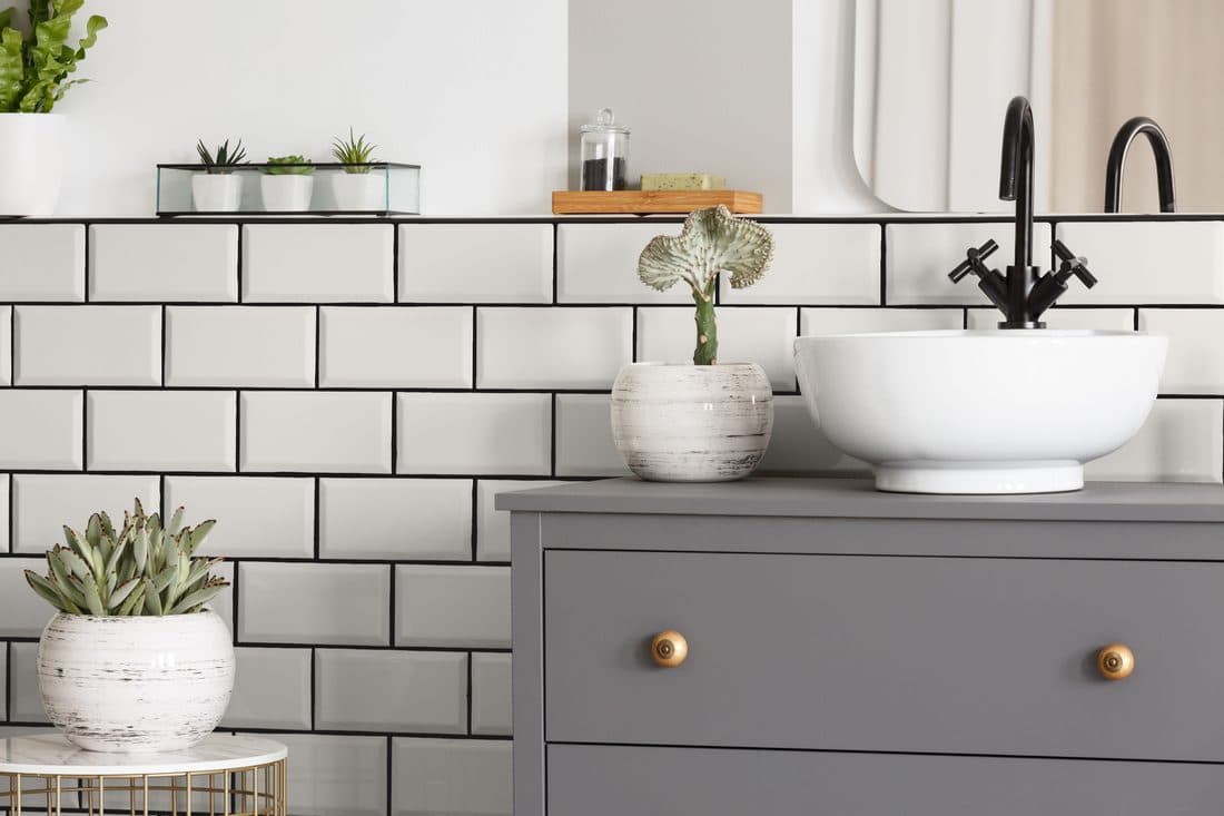 Painted metalwork and railings in a soft grey tone